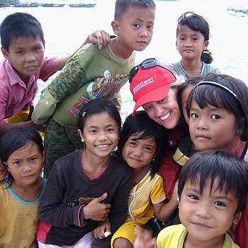 Coolum’s Jill Hofmann has fun with local children on last year’s trip to North Sumatra. Coolum’s Jill Hofmann has fun with local children on last year’s trip to North Sumatra.