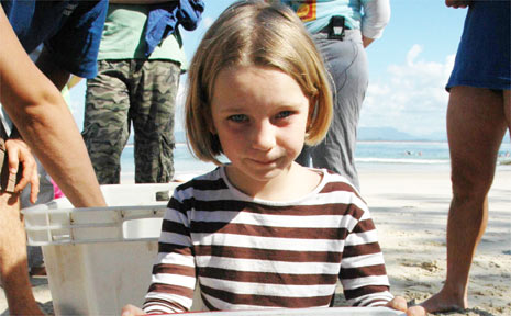 Meleah Snow of Cairns with the green turtles. Meleah Snow of Cairns with the green turtles.