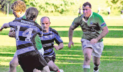 Lennox Head’s left winger Matt Ahern takes the ball up team mate and loose head prop Corey Windle looms in support. Lennox Head’s left winger Matt Ahern takes the ball up team mate and loose head prop Corey Windle looms in support.