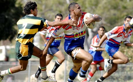 MAIN: Northern United’s Brett Kelly (left) puts the chase on Grafton’s Ray Mercy at the Aboriginal Rugby League Knockout Carnival at Crozier Field, Lismore, at the weekend. MAIN: Northern United’s Brett Kelly (left) puts the chase on Grafton’s Ray Mercy at the Aboriginal Rugby League Knockout Carnival at Crozier Field, Lismore, at the weekend.