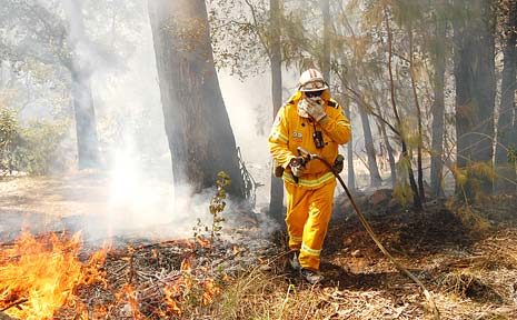 MORE TO COME: Byron Bay Rural Fire Service deputy captain Steve Cullen during local fires in August. MORE TO COME: Byron Bay Rural Fire Service deputy captain Steve Cullen during local fires in August.