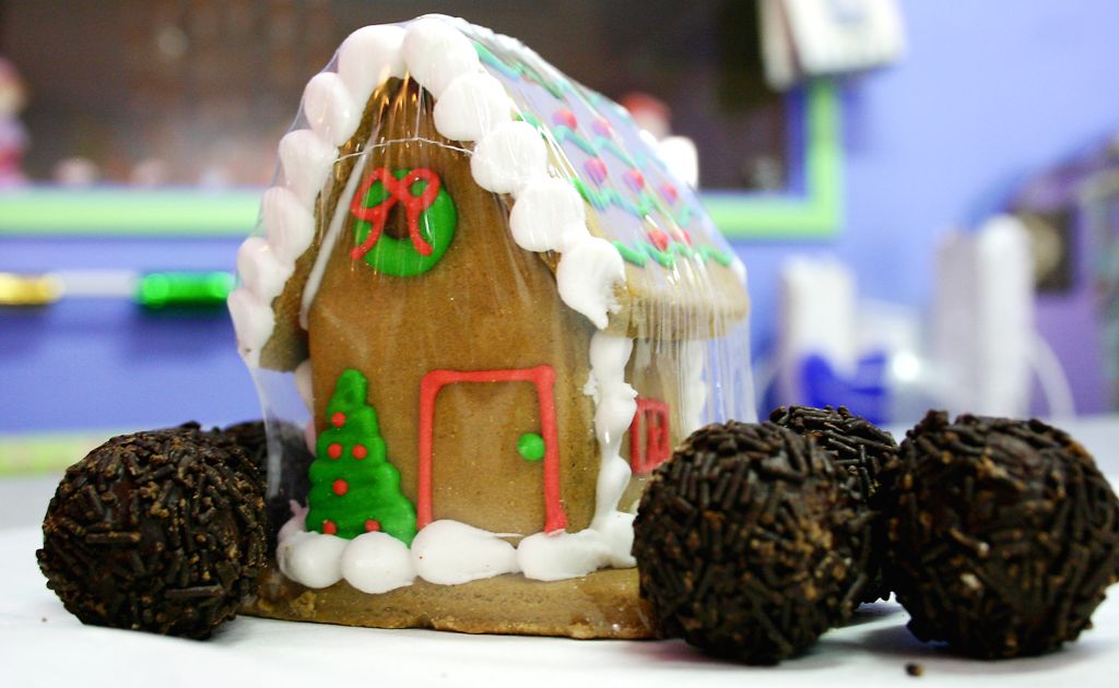 A hand-made gingerbread house. A hand-made gingerbread house.