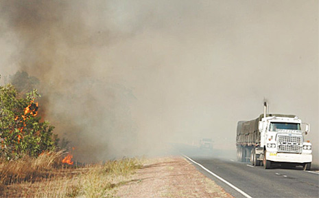 Fire raged through the National Park on Goodwood Road fanned by strong northerly winds causing a visibility problem for traffic. Fire raged through the National Park on Goodwood Road fanned by strong northerly winds causing a visibility problem for traffic.