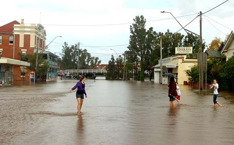 EARLY SIGNS: Floodwaters take their toll on Lismore with waters rising in Bridge Street, North Lismore. EARLY SIGNS: Floodwaters take their toll on Lismore with waters rising in Bridge Street, North Lismore.