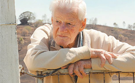 As he surveys his land, Dudley Roffey is reminded of the worst fires he has seen since 1951. As he surveys his land, Dudley Roffey is reminded of the worst fires he has seen since 1951.