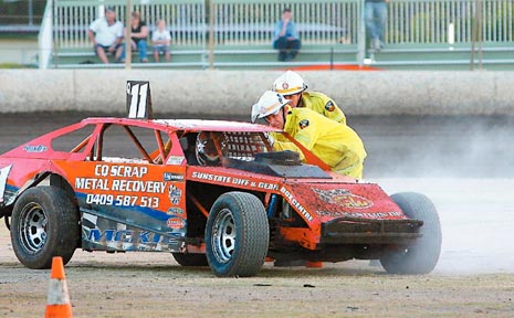 ON FIRE: Dave McKie's chances of adding to his series lead in the V8 AMCA Nationals ended up with a few problems with his vehicle which needed checking by firefighters after he left the track trailing smoke or steam. ON FIRE: Dave McKie's chances of adding to his series lead in the V8 AMCA Nationals ended up with a few problems with his vehicle which needed checking by firefighters after he left the track trailing smoke or steam.