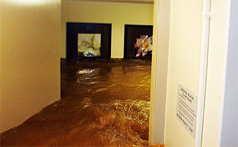 The lobby of Creek Towers in Coffs Harbour is inundated with floodwater at 10pm on Friday night. The water level can be identified by the pictures hanging on the back wall at head height. The lobby of Creek Towers in Coffs Harbour is inundated with floodwater at 10pm on Friday night. The water level can be identified by the pictures hanging on the back wall at head height.