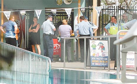 Police make enquiries at the Goodna Aquatic Centre after a young girl was found unconscious in the pool. Police make enquiries at the Goodna Aquatic Centre after a young girl was found unconscious in the pool.