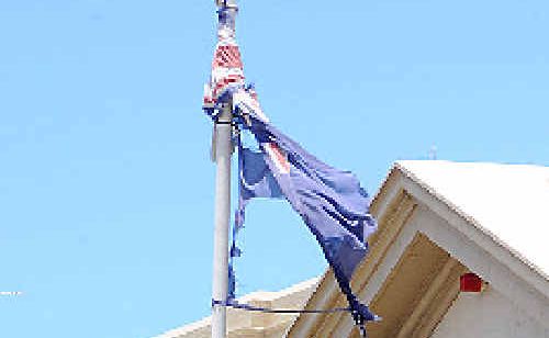 The tattered flag outside Cellblock Backpackers will soon be replaced. The tattered flag outside Cellblock Backpackers will soon be replaced.