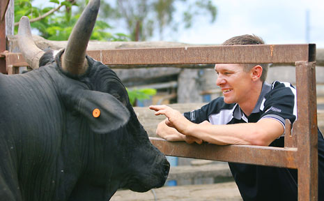 BULL WHISPERER: Stock contractor Brian Duggan with Maneater, a bull that lives up to his fearsome name. BULL WHISPERER: Stock contractor Brian Duggan with Maneater, a bull that lives up to his fearsome name.