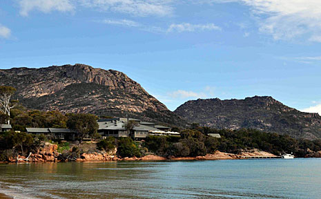 Freycinet Lodge has the Hazards mountain range as its imposing backdrop. Freycinet Lodge has the Hazards mountain range as its imposing backdrop.