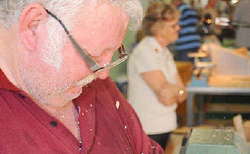 Woodturner Jarn Yellverton amazes the crowds with a display of his steady-handed skill at the Wood and Craft Expo. Woodturner Jarn Yellverton amazes the crowds with a display of his steady-handed skill at the Wood and Craft Expo.