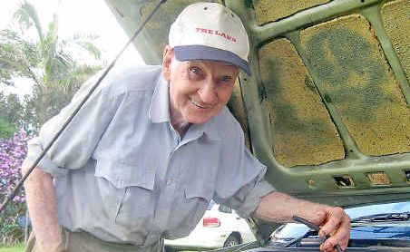 Bill with the hydrogen cell he has installed on his Subaru station wagon. Bill with the hydrogen cell he has installed on his Subaru station wagon.