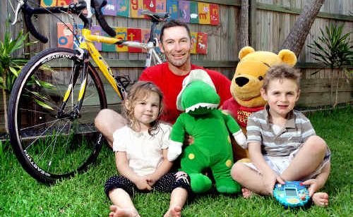 Mat Britton – with his two children, Lily, 3, and Alec, 5 – will ride in a Springfield charity toy bike ride as well as a fundraiser from Sydney to the Gold Coast. Mat Britton – with his two children, Lily, 3, and Alec, 5 – will ride in a Springfield charity toy bike ride as well as a fundraiser from Sydney to the Gold Coast.