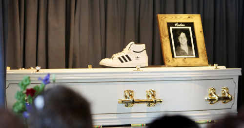 Rueben Barnes’ coffin is marked with a pair of his skate shoes at his funeral service in Rockhampton. Rueben Barnes’ coffin is marked with a pair of his skate shoes at his funeral service in Rockhampton.