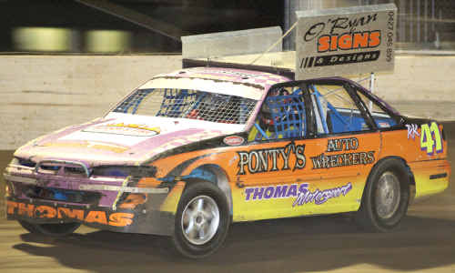Matt Thomas on his way to second in the feature race of Saturday’s Super Street Sedan Challenge. Matt Thomas on his way to second in the feature race of Saturday’s Super Street Sedan Challenge.