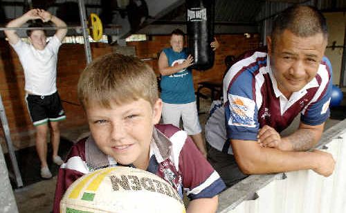 New Casino Cougars rugby league coach John Sione Va’a (right) with some of the club’s juniors Michael MacRae, 10, (front), Mitchell MacRae, 17, (rear left), and Brendan MacRae, 13. New Casino Cougars rugby league coach John Sione Va’a (right) with some of the club’s juniors Michael MacRae, 10, (front), Mitchell MacRae, 17, (rear left), and Brendan MacRae, 13.