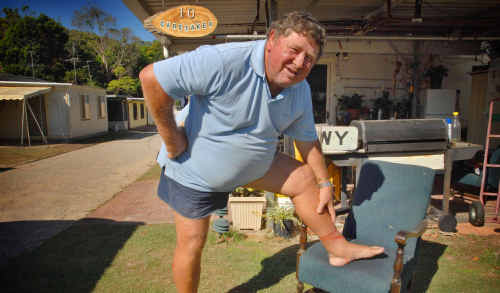 John Cockbain at home at the Clarence River Caravan Park after his water rat attack. John Cockbain at home at the Clarence River Caravan Park after his water rat attack.