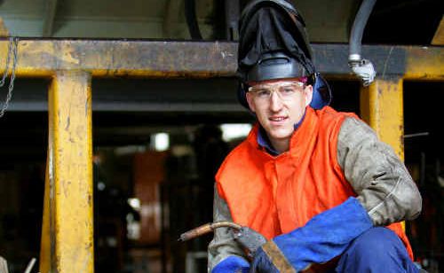 Queensland Rail employee Craig Bosel puts the finishing touches on a safety platform prototype which he designed. Queensland Rail employee Craig Bosel puts the finishing touches on a safety platform prototype which he designed.