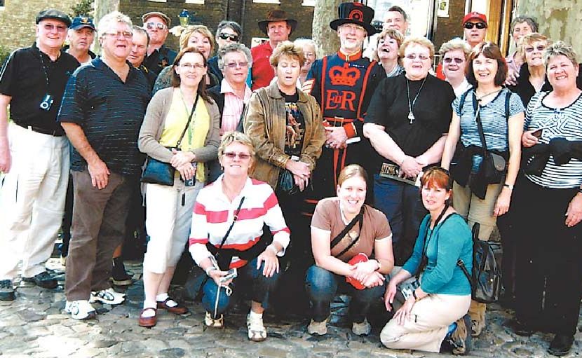 The Tweed Valley Travellers and a Beefeater guard at the Tower of London. The Tweed Valley Travellers and a Beefeater guard at the Tower of London.
