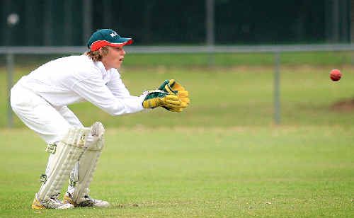 SAM Reading, 15, behind the stumps for Murwillumbah on Saturday. SAM Reading, 15, behind the stumps for Murwillumbah on Saturday.