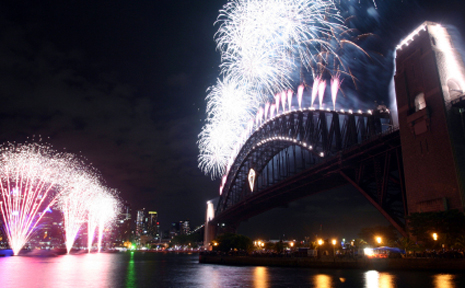 Sydney Harbour lights up the New Year's Eve skyline. Sydney Harbour lights up the New Year's Eve skyline.