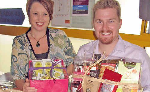 Lismore City Council tourism support officer Lisa Audus and tourism co-ordinator Mitch Lowe with some of the gift packs containing local goodies. Lismore City Council tourism support officer Lisa Audus and tourism co-ordinator Mitch Lowe with some of the gift packs containing local goodies.