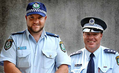 New Wooli police officer Senior Constable Matt Hegarty, left, with former Wooli officer Acting Inspector Darren Williams. New Wooli police officer Senior Constable Matt Hegarty, left, with former Wooli officer Acting Inspector Darren Williams.