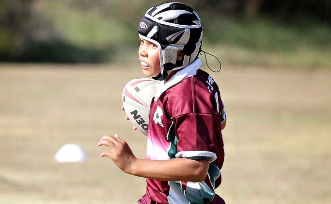 St James' Ethan Simpson, 10, found himself in plenty of open space against St Josephs. St James' Ethan Simpson, 10, found himself in plenty of open space against St Josephs.