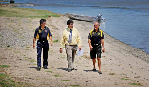 Flanked by Grafton Rowing Club vice-president Dennis Darke (left) and president Greg Thompson (right) Mayor Richie Williamson examines the work done on the riverbank outside the Grafton Rowing club. Flanked by Grafton Rowing Club vice-president Dennis Darke (left) and president Greg Thompson (right) Mayor Richie Williamson examines the work done on the riverbank outside the Grafton Rowing club.