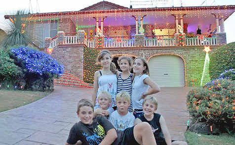 Proudly showing off the lights at the Stuckeys home in Trinity Drive are young residents (rear l-r) Stacey Gianneas, Olivia Bezrouchko and Matika Hughes with (front l-r) Sam Martin, Daniel Wall, Nathan Bezrouchko and Harry Martin. Proudly showing off the lights at the Stuckeys home in Trinity Drive are young residents (rear l-r) Stacey Gianneas, Olivia Bezrouchko and Matika Hughes with (front l-r) Sam Martin, Daniel Wall, Nathan Bezrouchko and Harry Martin.