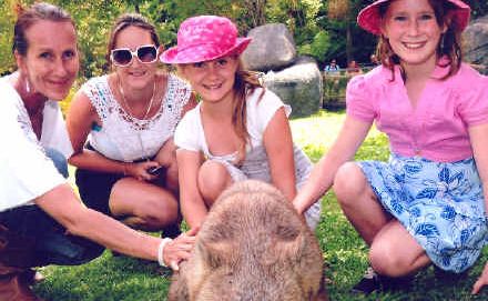 Sherida Parker and daughters Rhiannon, Marie and Kyra enjoy a close encounter with a wombat. Sherida Parker and daughters Rhiannon, Marie and Kyra enjoy a close encounter with a wombat.