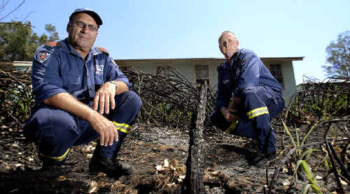 Firefighter Col Bennett (left) and Casino fire station commander Glen Whitehead at the scene of a fire that broke out near the boundary of Casino Primary School. Firefighter Col Bennett (left) and Casino fire station commander Glen Whitehead at the scene of a fire that broke out near the boundary of Casino Primary School.
