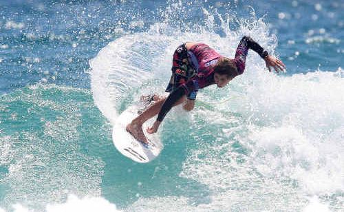 Angourie’s Jeames Young smashes his rivals at the Rip Curl GromSearch at Duranbah Beach on the Gold Coast yesterday. Angourie’s Jeames Young smashes his rivals at the Rip Curl GromSearch at Duranbah Beach on the Gold Coast yesterday.