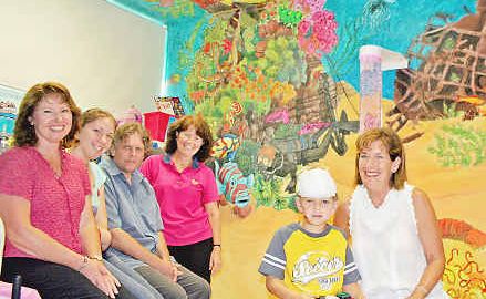 Showing off the new mural in the treatment room at Lismore Base Hospital’s Children’s Ward are Danielle Channon’s mum Wendy and young patient Noah Riordan with artists Jenny and Kate Robson, Tim Mosely and Children’s Ward play therapist Mal Mosely. Showing off the new mural in the treatment room at Lismore Base Hospital’s Children’s Ward are Danielle Channon’s mum Wendy and young patient Noah Riordan with artists Jenny and Kate Robson, Tim Mosely and Children’s Ward play therapist Mal Mosely.