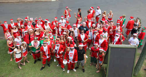 A sea of Santas gathers to take part in the annual Santa Claus Pub Crawl in Grafton. A sea of Santas gathers to take part in the annual Santa Claus Pub Crawl in Grafton.