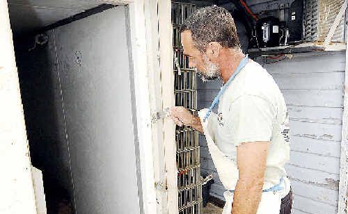Ballina oyster farmer and seafood retailer Geoff Lawyer inspects the cool room that thieves broke into to steal oysters. Ballina oyster farmer and seafood retailer Geoff Lawyer inspects the cool room that thieves broke into to steal oysters.