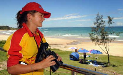 Minnie Water-Wooli surf club volunteer Pauline McLeod inspects the beach from the new surf club. Minnie Water-Wooli surf club volunteer Pauline McLeod inspects the beach from the new surf club.
