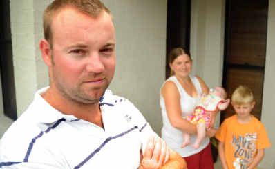 Kris Longstaff, left, his wife Kris Longstaff, left, his wife