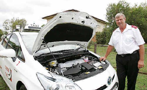 Taxi owner Phil Michalk is happy with his new petrol/electric hybrid cab, saying it saves money and the environment. Taxi owner Phil Michalk is happy with his new petrol/electric hybrid cab, saying it saves money and the environment.