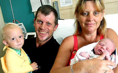 Tweed’s first baby of 2010, Jett Garland with mother Kellie Schroeder, dad Brad Garland and brother Jack. Tweed’s first baby of 2010, Jett Garland with mother Kellie Schroeder, dad Brad Garland and brother Jack.