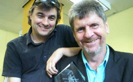David Tindale and Darmin Cameron with their Spirit of Woodford Video Award. David Tindale and Darmin Cameron with their Spirit of Woodford Video Award.