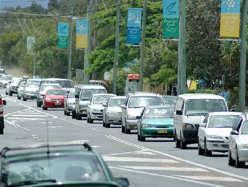 Traffic queued along Ewingsdale Road at Byron Bay. Traffic queued along Ewingsdale Road at Byron Bay.