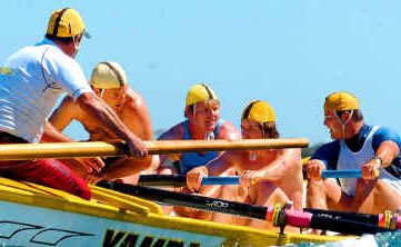 One of the Yamba surf boat crews competing at Main Beach, Yamba, last year. One of the Yamba surf boat crews competing at Main Beach, Yamba, last year.