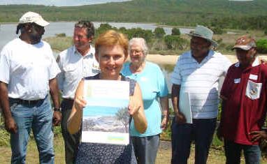 Author Dr Johanna Kijas holds up a new book containing stories of the Yuraygir National Park. Behind her are some of the contributors: Fox Laurie (Yaegl), Andrew Lugg (NPWS), Marie Preston, Ron Heron (Yaegl) and Cecil Laurie (Gumbaingirr). Author Dr Johanna Kijas holds up a new book containing stories of the Yuraygir National Park. Behind her are some of the contributors: Fox Laurie (Yaegl), Andrew Lugg (NPWS), Marie Preston, Ron Heron (Yaegl) and Cecil Laurie (Gumbaingirr).