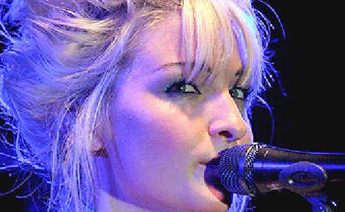 Kate Miller-Heidke is one of the Aussie performers travelling to Texas. Kate Miller-Heidke is one of the Aussie performers travelling to Texas.