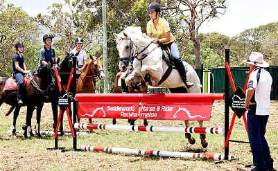 Matilda Mills puts on a show at a recent showjumping summer camp in Yeppoon with 60 other riders. Matilda Mills puts on a show at a recent showjumping summer camp in Yeppoon with 60 other riders.