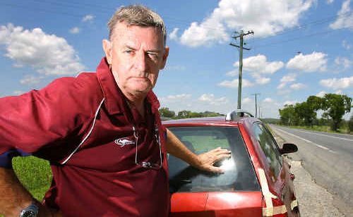 Bob Matthews on the Capricorn Highway where his car was rammed by a 4WD in what appears to have been a road rage incident. Bob Matthews on the Capricorn Highway where his car was rammed by a 4WD in what appears to have been a road rage incident.