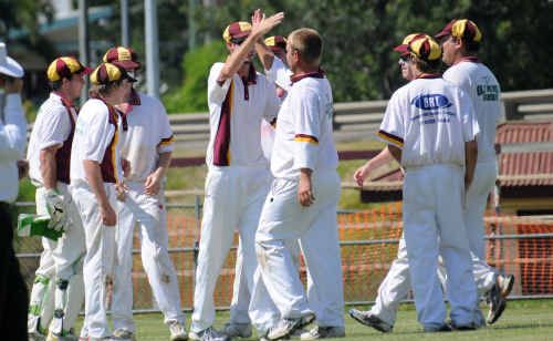 Bundy team-mates congratulate Rhys Grills after taking the wicket of Gympie Batsman Lewis Waugh, but celebrations were short-lived. Bundy team-mates congratulate Rhys Grills after taking the wicket of Gympie Batsman Lewis Waugh, but celebrations were short-lived.