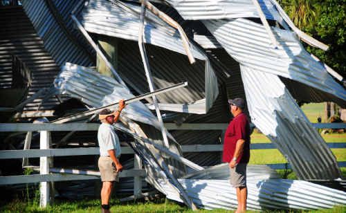 Grafton Pony Club president Alan Watkins and president of the users group Alan Stewart look at the damage to the pony club sheds after Sunday evening’s storm. Grafton Pony Club president Alan Watkins and president of the users group Alan Stewart look at the damage to the pony club sheds after Sunday evening’s storm.